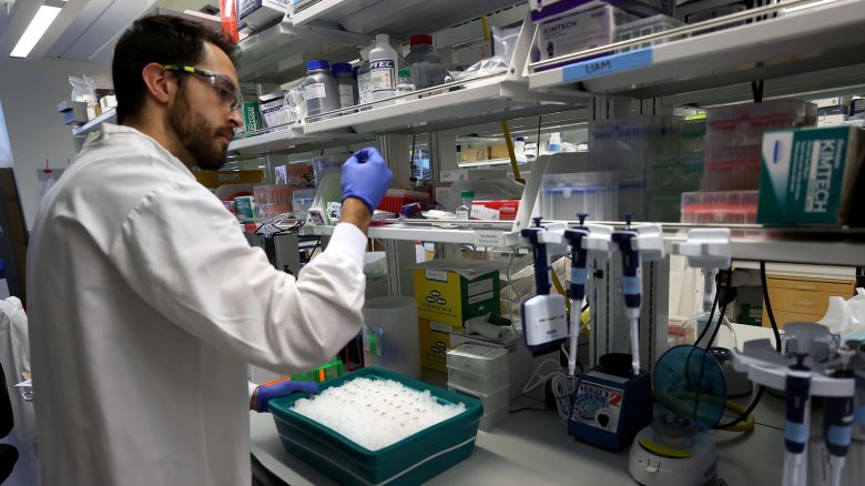 Cambridge, MA - May 14: Jon Arizti Sanz, PhD, Postdoctoral Fellow preparing for the extraction protocol while in the lab.The Broad institute, Sabeti Lab is testing purchased milk at area grocery stores for the presence of bird flu. (Photo by David L. Ryan/The Boston Globe via Getty Images)