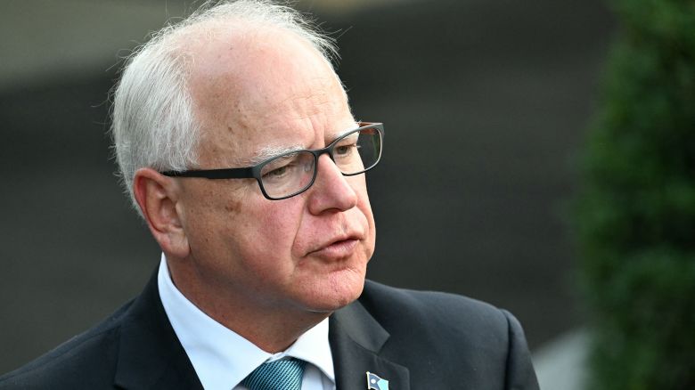 Governor of Minnesota Tim Walz speaks to reporters after meeting with US President Joe Biden at the White House in Washington, DC, July 3, 2024. Democratic governors offered their continued support for US President Joe Biden in a meeting with him to discuss the fallout from his disastrous debate performance, Maryland Governor Wes Moore said on July 3. "We said that we would stand with him," Moore told reporters after the meeting at the White House, with Minnesota Governor Tim Walz adding that 81-year-old Biden -- whose debate performance has provoked calls for him to drop out of the White House race -- was "fit for office." (Photo by Jim WATSON / AFP) (Photo by JIM WATSON/AFP via Getty Images)