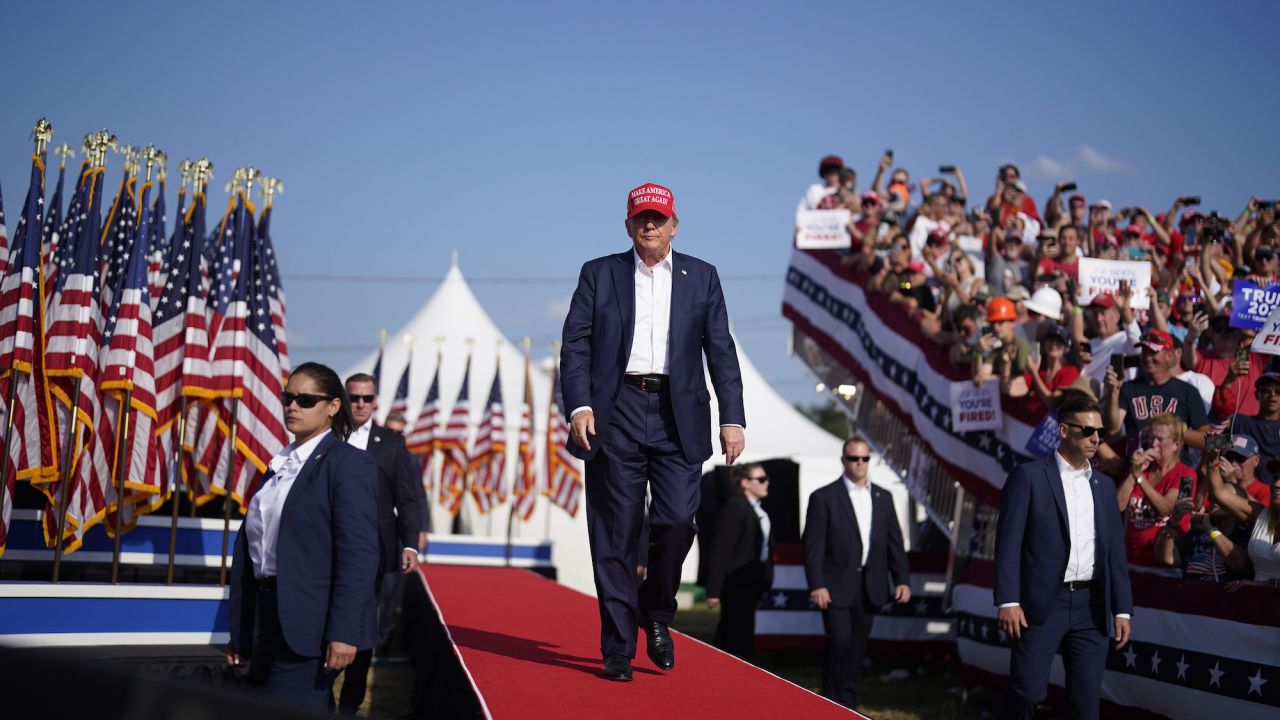 BUTLER, PENNSYLVANIA - July 13: Former president Donald Trump walks onstage during a campaign rally for former President Donald Trump at Butler Farm Show Inc. on Saturday, July 13, 2024 in Butler, Pa. Trump ducked and was taken offstage after loud noises were heard after he began speaking. 
(Photo by Jabin Botsford/The Washington Post via Getty Images)