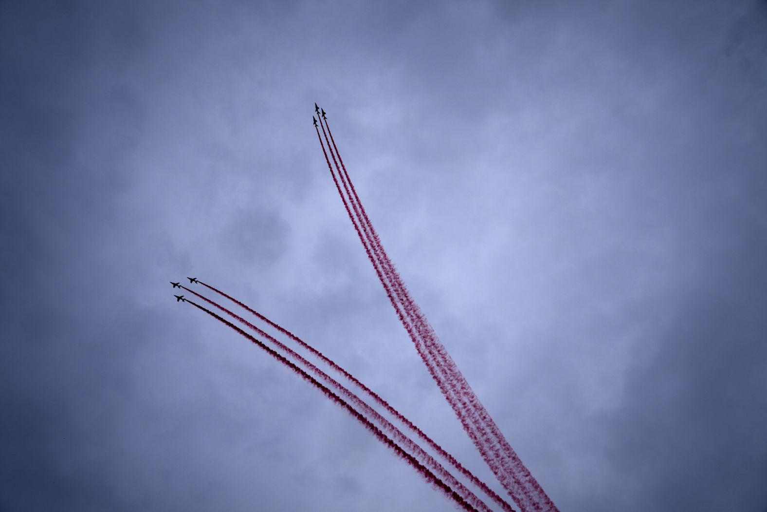 Planes perform over the Seine River during the ceremony. A shape of a heart was made in the sky.