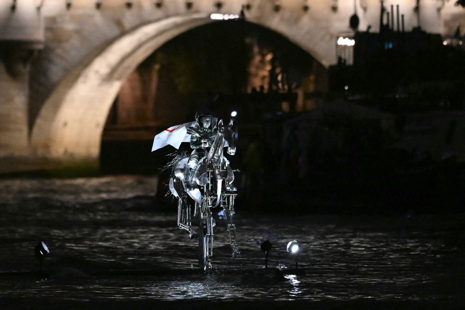 Issert wore the Olympic flag as she <a href="https://www.cnn.com/sport/live-news/paris-olympics-2024-opening-ceremony-seine#h_8b8665772097d280bfa8418324861f82"