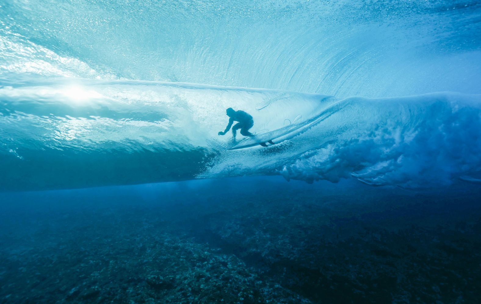 France's Joan Duru gets into the barrel during the first round of the surfing competition on July 27. The surfing events are <a href="https://www.cnn.com/2024/07/08/sport/tahiti-summer-olympics-2024/index.html"