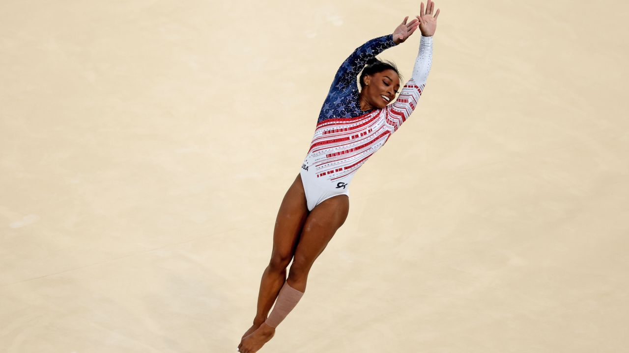 PARIS, FRANCE - JULY 30: Simone Biles of Team United States competes in the floor exercise during the Artistic Gymnastics Women's Team Final on day four of the Olympic Games Paris 2024 at Bercy Arena on July 30, 2024 in Paris, France. (Photo by Patrick Smith/Getty Images)