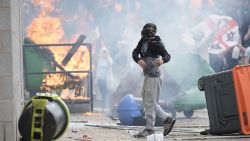 ROTHERHAM, ENGLAND - AUGUST 4: Anti-migration protesters are seen during riots outside of the Holiday Inn Express in Manvers, which is being used as an asylum hotel, on August 4, 2024 in Rotherham, United Kingdom. Yesterday saw widespread violence as Far-right agitators in Liverpool and Manchester rioted and looted shops. Police were attacked and injured and dozens of arrests were made. (Photo by Christopher Furlong/Getty Images)