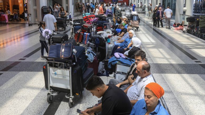 People await their flights at the Beirut International Airport departure hall on August 5, 2024. Urgent calls grew for foreign nationals to leave Lebanon, which would be on the front line of a regional war, as Iran and its allies readied their response to high-profile killings blamed on Israel. (Photo by AFP) (Photo by -/AFP via Getty Images)