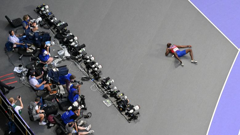 Noah Lyles collapsed after coming in third in the men's 200 meters on Thursday.