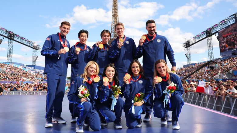 PARIS, FRANCE - AUGUST 07: Members of the U.S. Olympic figure skating team pose for a photo after receiving gold medals following the disqualification of Team Russia for doping after the 2022 Winter Games in Beijing on day twelve of the Olympic Games Paris 2024 at Champions Park on August 07, 2024 in Paris, France. (Photo by Michael Reaves/Getty Images)