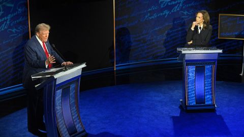 Kamala Harris listens as Donald Trump speaks during the ABC presidential debate in Philadelphia on September 10, 2024.