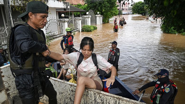 Local rescue teams pick up schoolchildren and residents during flooding in Chiang Rai, Thailand on September 12, 2024.