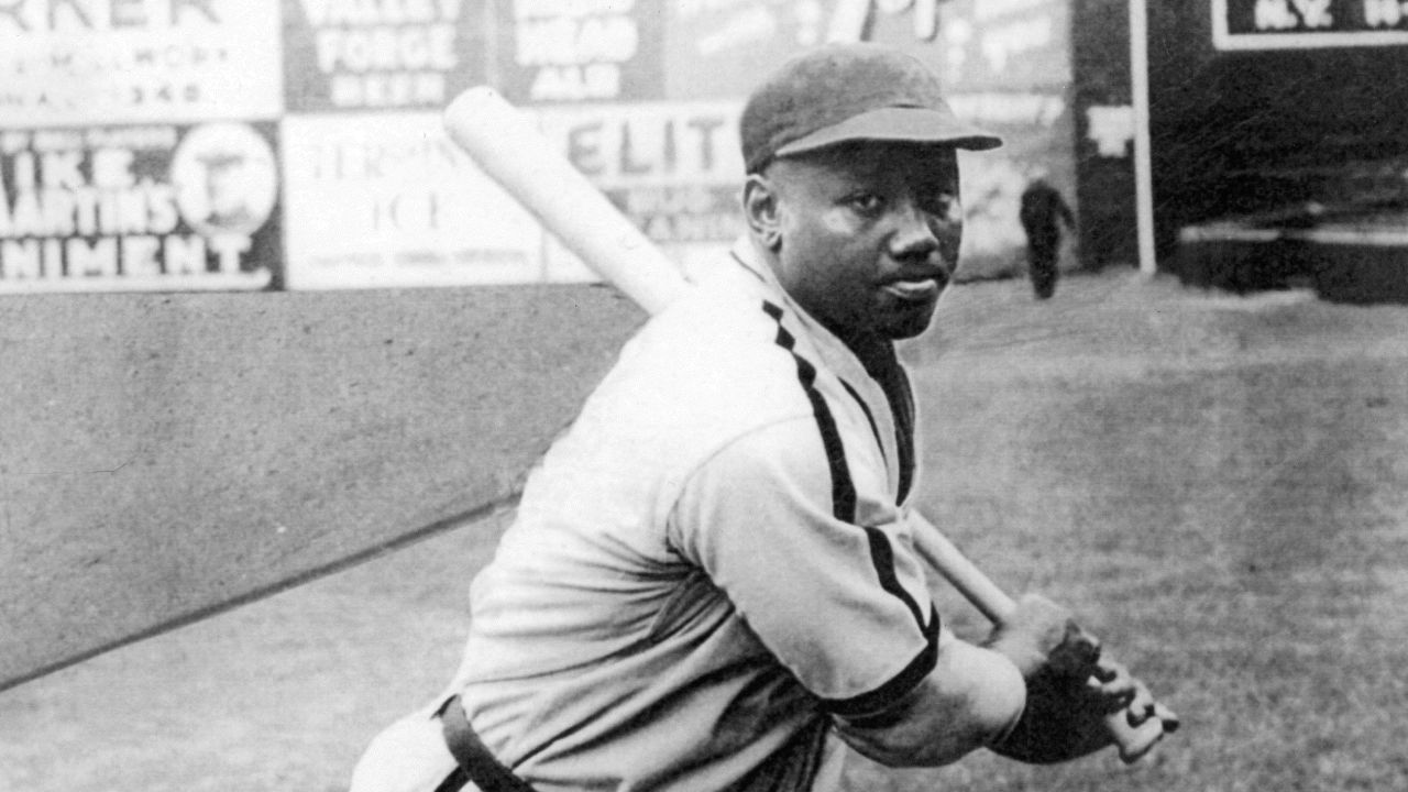 Josh Gibson, catcher for the Negro League Homestead Grays of Pittsburgh, practices his swing before a game at Forbes Field in 1940.