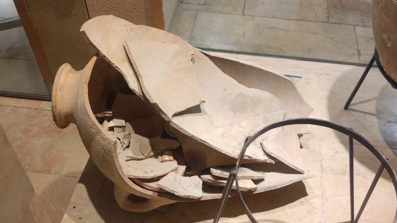 A 3,500-year-old jar accidentally smashed into pieces by a four-year-old boy is seen in a museum in Israel.