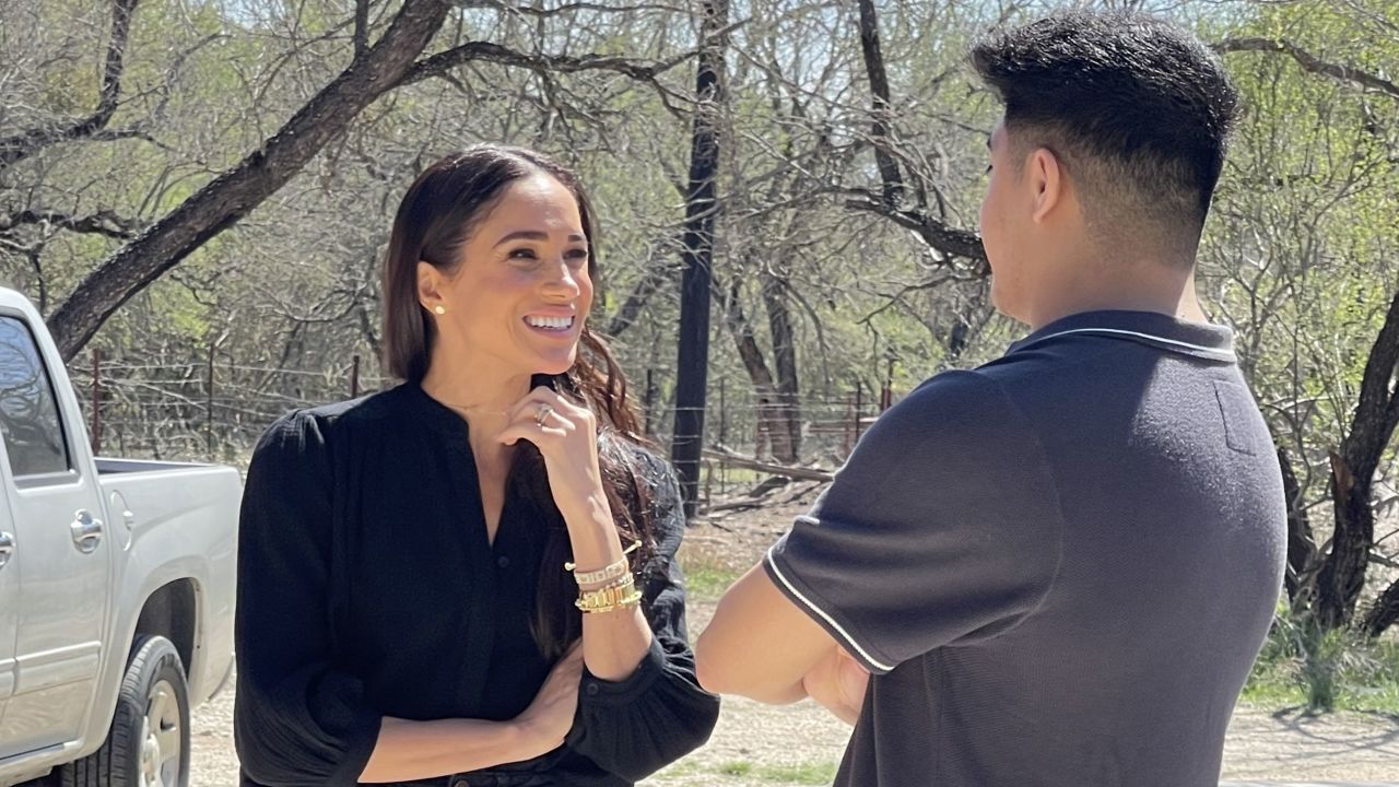 John Martinez talks with Meghan, Duchess of Sussex.