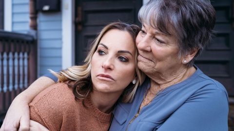 Victoria Hill and her mother, Maralee Hill, pose for a portrait outside her home in Wethersfield, Connecticut.