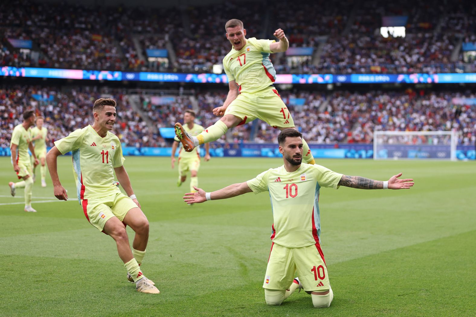 Spain's Álex Baena (No. 10) celebrates after scoring a goal to put his team up 3-1 in the soccer final against France on August 9. France fought back to tie the match and force extra time, but <a href="https://www.cnn.com/sport/live-news/paris-olympics-news-2024-08-09#h_d66711a81d2f406b9513517ae7f36b66"