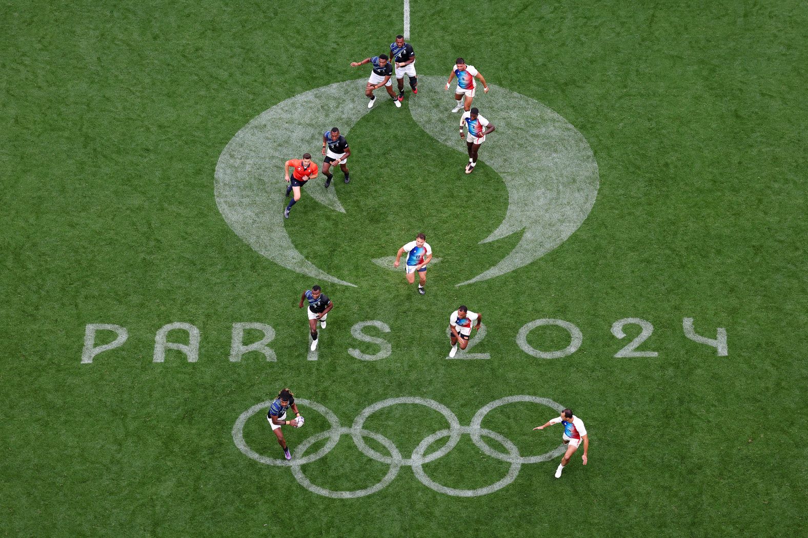 Fiji's Selestino Ravutaumada carries the ball during the rugby sevens final against France on July 27. France won the match for <a href="https://www.cnn.com/sport/live-news/paris-olympics-news-2024-07-27#h_d459e9fe5b9949f1ac2cee5f45330804"