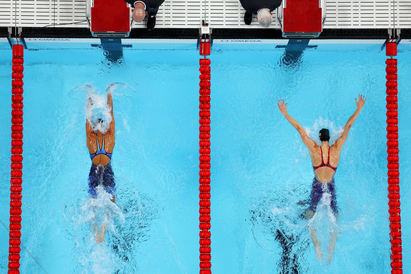 American swimmer Torri Huske, left, edges teammate Gretchen Walsh as they <a href="https://www.cnn.com/sport/live-news/paris-olympics-news-2024-07-28#h_47d44f200db29e1a92041cc0698e034b"