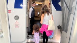 Ivan Watson's wife and 3-year-old daughter board a Turkish Airlines flight from Beirut Rafik al Hariri Airport on Sunday after cutting short a visit to Lebanon due to escalating tensions.