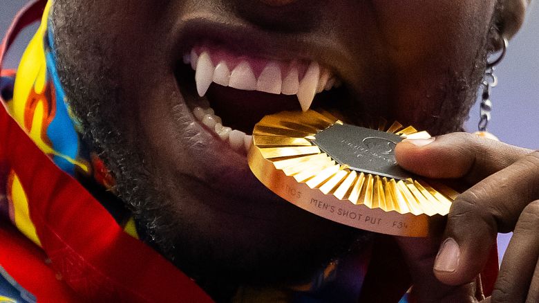 PARIS, FRANCE - SEPTEMBER 07: Gold medalist, Mauricio Valencia of Team Colombia, poses for a photo during the medal ceremony for the Men's Shot Put F34 Final on day ten of the Paris 2024 Summer Paralympic Games at Stade de France on September 07, 2024 in Paris, France. (Photo by David Ramos/Getty Images)