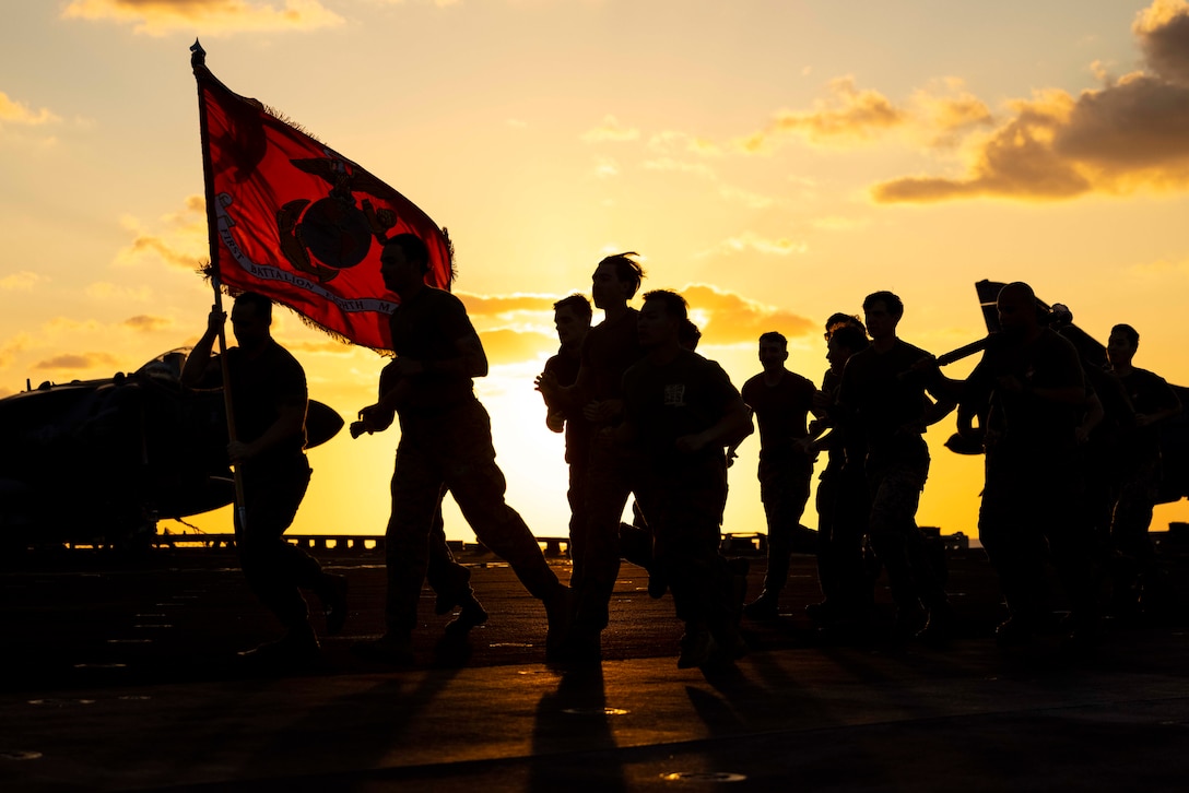 U.S. Marines and Sailors with Battalion Landing Team 1/8 conduct a memorial run in remembrance of the 1983 Marine barracks bombing in Beirut, Lebanon, aboard the amphibious assault ship USS Wasp (LHD 1) while underway in the Mediterranean Sea, Oct. 20, 2024. The Wasp (WSP) Amphibious Ready Group (ARG) and embarked 24th MEU (SOC) is conducting operations in the U.S. Naval Forces Europe and Africa area of operations on a scheduled deployment. The WSP ARG-24th MEU (SOC) is supporting U.S., Allied and partner interests in the region, including in the Eastern Mediterranean Sea, to continue promoting regional stability and deterring aggression. (U.S. Marine Corps photo by Lance Cpl. John Allen)