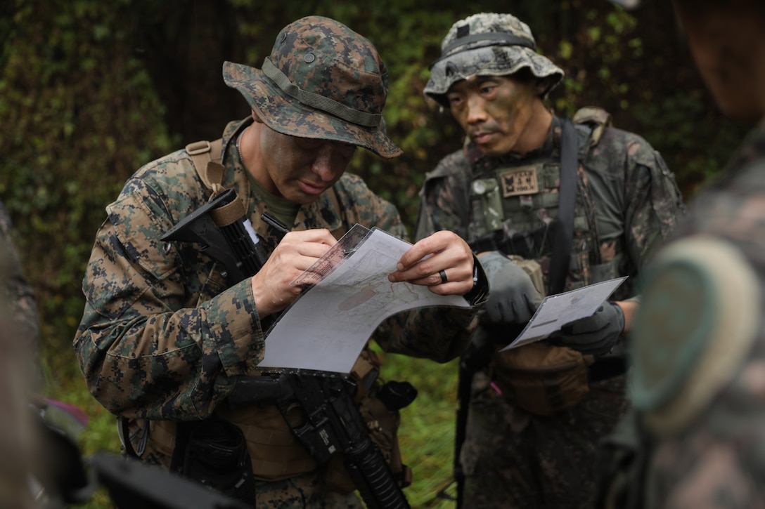 U.S and Republic of Korea Senior Enlisted Leaders plot grid coordinates during the land navigation event as part of Mangudai 2024 in South Korea. Mangudai is an annual training exercise that builds senior enlisted leaders' joint camaraderie and reinforces their mastery of core Soldiering tasks.