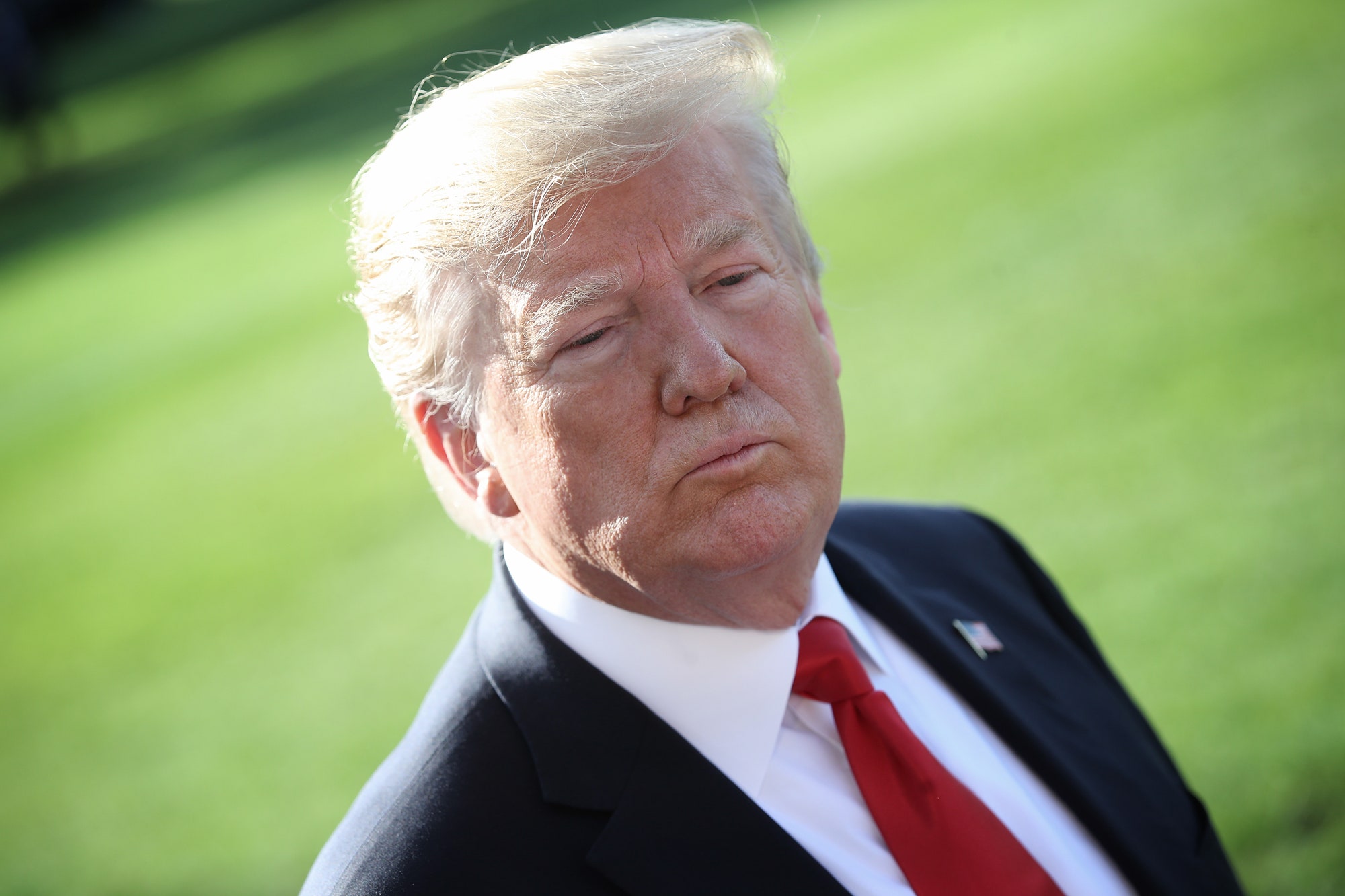 President Trump speaking to reporters on the White House lawn.