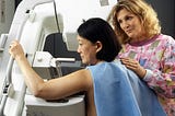 A woman undergoing mammography.