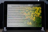 Rhyming poetry titled “Living on in you”.  Yellow buttercups in the photo screen displayed with the poem.