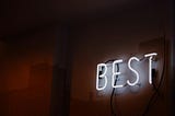 Neon sign that says “best”