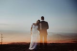 bride and groom off into the future — spirits fading away.