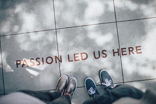 Overhead view of phrase “Passion Led Us Here”