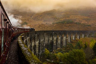 A train understood to be the Hogwarts Express chugs along its famed route toward the legendary school for witches and wizards.