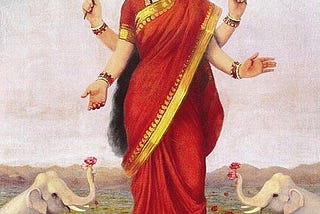 The Hindu goddess Lakshmi rises up out of a lotus flower. She has four arms, two holding red lotuses. She wears a red crown and a red robe with gold trim. White elephants stand on either side of her.