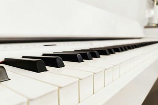 close up photo of white piano keys