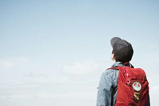 This kid is going to miss the bus because he’s too busy looking at airplanes PAY ATTENTION KID.