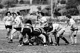 Black and white photo of women playing sport