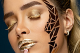 A woman with golden makeup