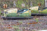 Rusting dodge-em cars in an old fairground in the city of Pripyat, Ukraine.