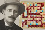 James Joyce poses by his winning game of Scrabble.