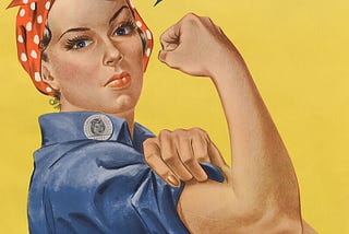 The famous We Can Do It! sign with a woman flexing her arm with rolled up sleeves.