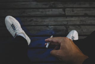 Man holding a cigarette