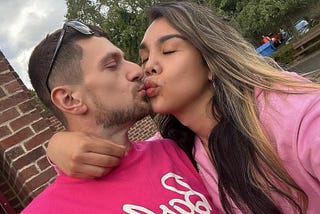 The author and her boyfriend kissing