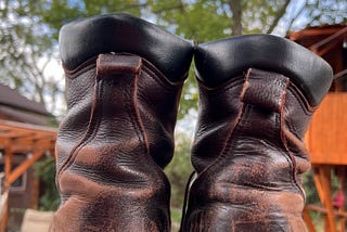 A worn pair of work boots