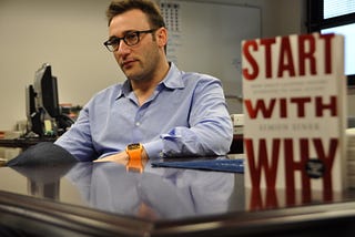 Simon Sinek at Travis Air Force Base with his book Start with Why