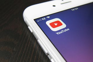 A phone showing the YouTube app.