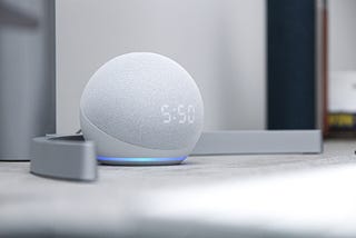 An amazon device called Alexa that allows you to send command voice orders. This device has several microphones and performs multichannel speech enhancement