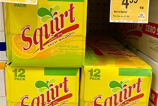 Boxes of the canned soft drink Squirt