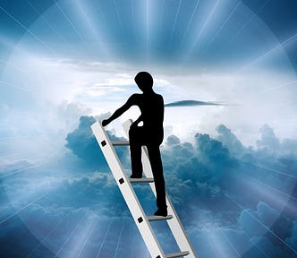 A silhouette of a person stands on a ladder with a blue sky behind them.