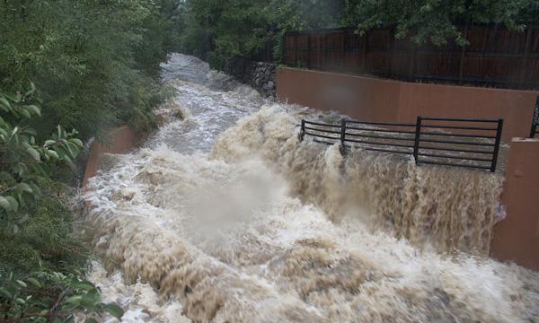 Boulder Creek floods onto nearby bike paths, as an example of graceful failure