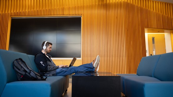 A Johnson student works in the Breazzano Center in Collegetown.