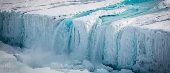 Waterfall of meltwater from Nansen Ice Shelf.